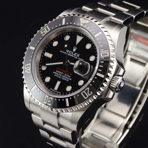 rolex sea dweller red writing.